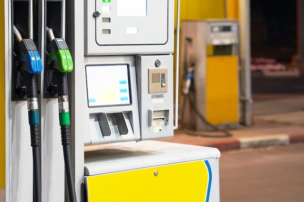 Gas pump nozzles in a station