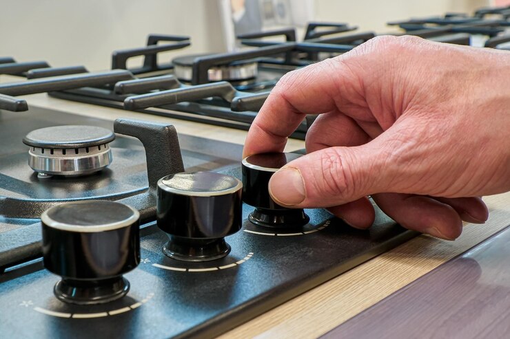 Gas stove Turning on and off the gas burner A home appliance store Consumer