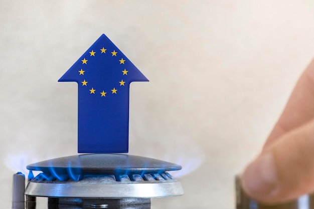 Gasprijsstijging van de gasprijzen in de europese unie een brander met een vlam en een pijl omhoog geschilderd in de