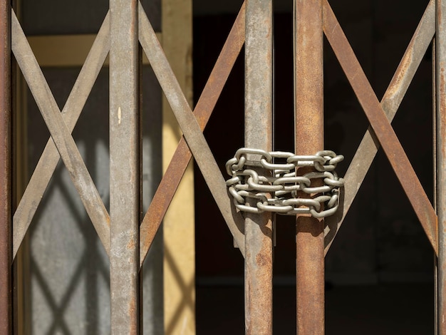 Gate bolted with chain