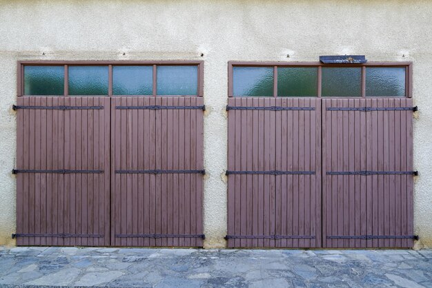 Gate home portal garage double door house windows facade