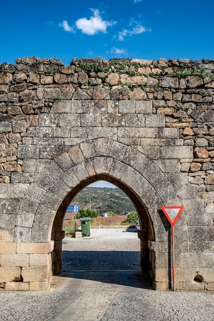 Gate in the old walls in the historic town of Miranda do Douro Portugal