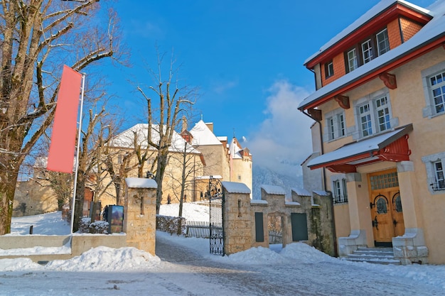 Gates to the castle of Gruyeres located in the medieval town of Gruyeres, Fribourg in Switzerland. Gruyeres is a famous Swiss tourist destination and gives its name to the well-known Gruyere cheese