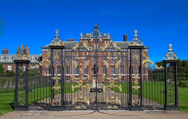 The gates of kensington palace in hyde park in london england