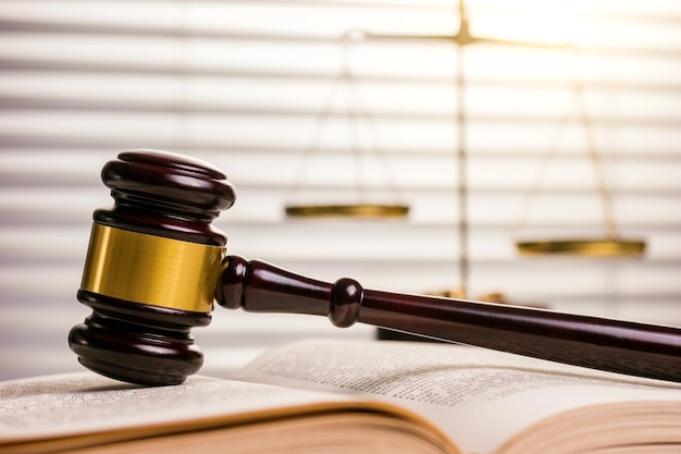 Gavel and a book with scale