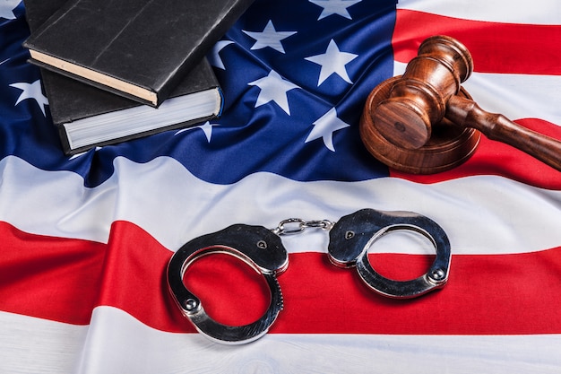 Gavel, handcuffs and american flag