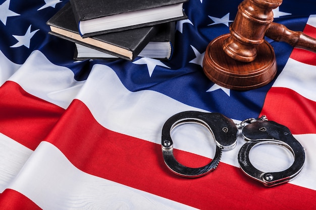 Gavel, handcuffs and american flag