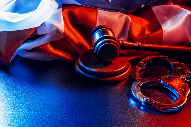 Gavel, handcuffs and american flag