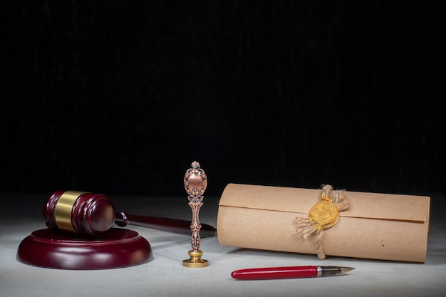 Gavel Notary's public pen and stamp on testament and last will. Notary public tools