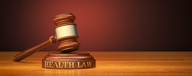 Gavel and sound block with text health law