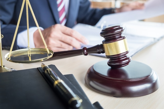 gavel and soundblock fo justice law and lawyer working on wooden desk background