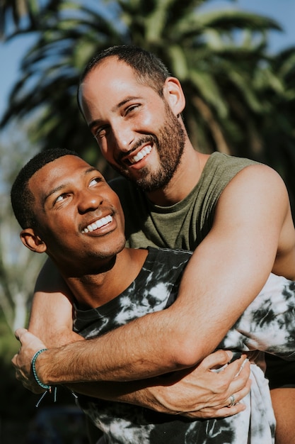 Gay couple hugging in the park