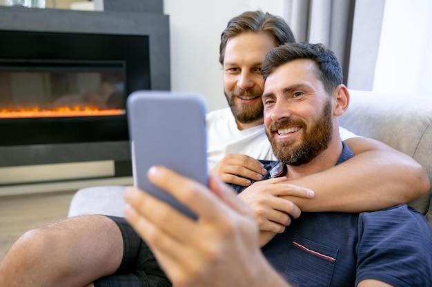 Gay couple lgbt make selfie at home