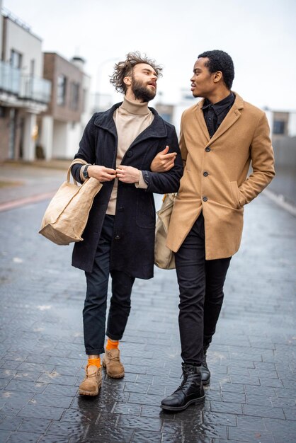 Gay couple walking together outdoors