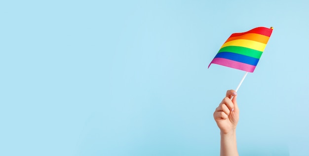 Gay flags in women's hand