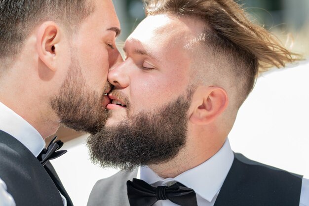 Gay kiss on wedding marriage gay couple tender kissing close up portrait of gay kissed gay couple