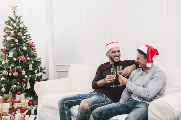 Gay male couple celebrating Chritsmas at home