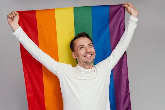 Gay man with lgbt symbol