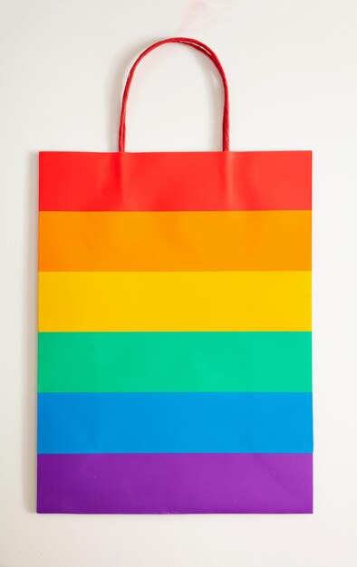 Gay pride flag shopping bag isolated against white background