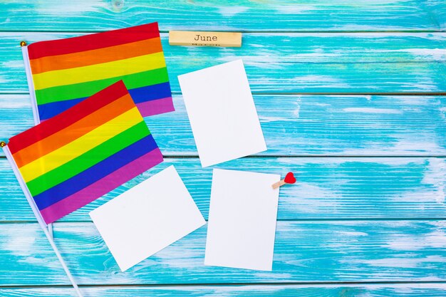 Gay pride flag on wooden table