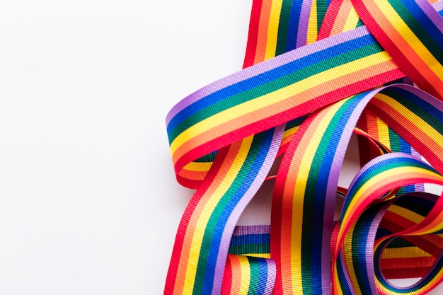 Gay pride LGBT rainbow ribbon on white background