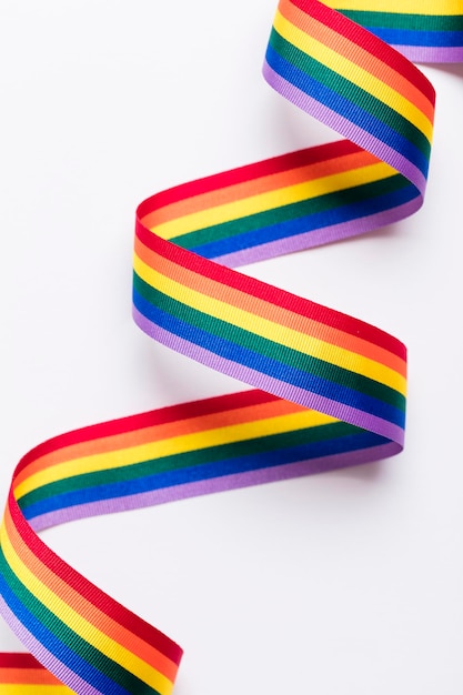 Gay pride LGBT rainbow ribbon on white background