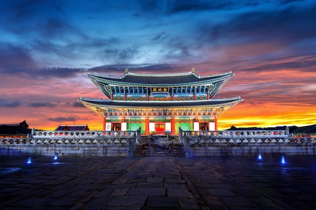 Photo gazebo in illuminated building against sky during sunset