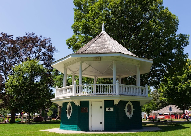 Gazebo in park against building