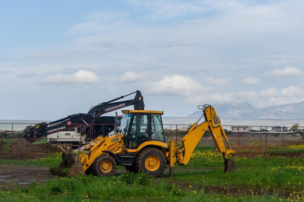 Gaziveren Cyprus 17022024 yellow tractor at a construction site 1