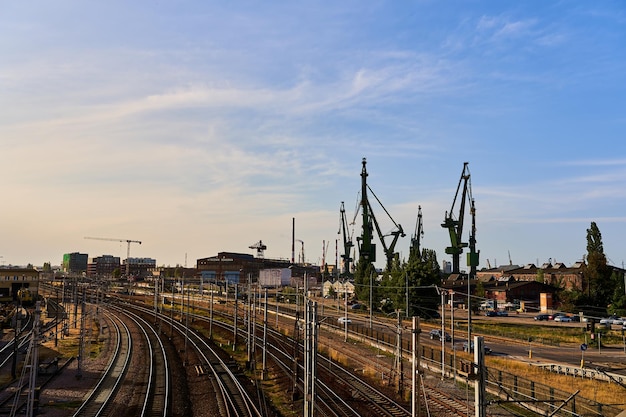 Gdansk Poland June 26 2023 Port cranes on the background of the city