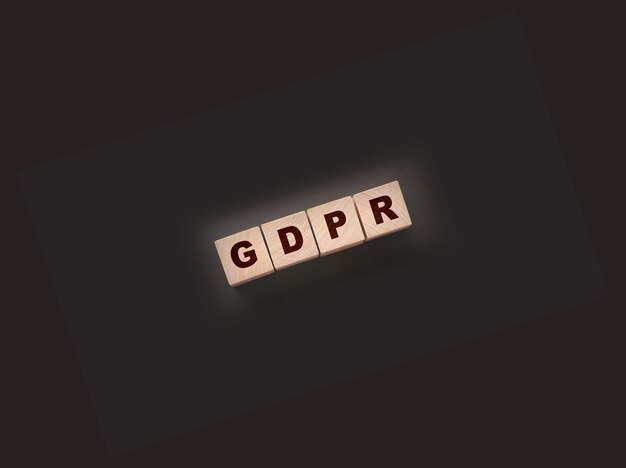 GDPR Word Written In Wooden Cubes on black