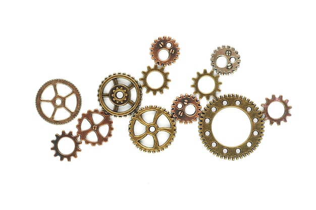 Gears bronze and copper shades of different diameters and type on a white background.