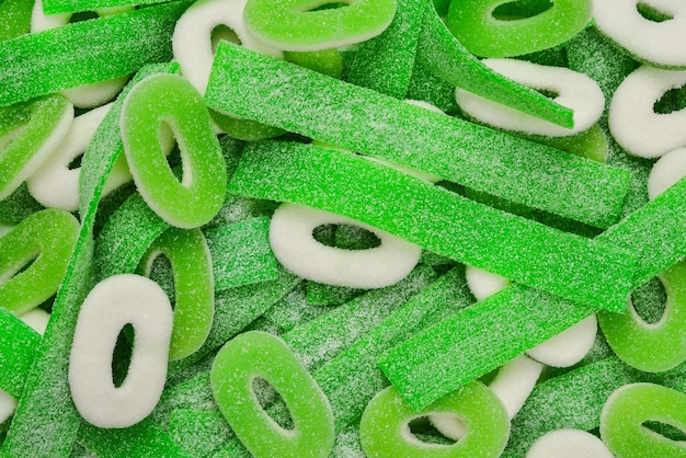 Geassorteerde groene gummy snoepjes achtergrond Bovenaanzicht Jelly snoepjes