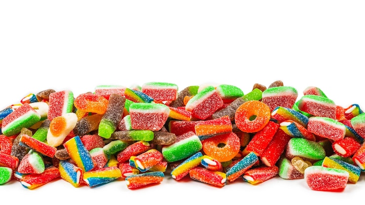 Foto geassorteerde gummy snoepjes bovenaanzicht jelly snoep achtergrond