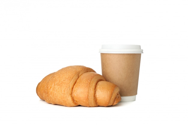 Gebakken croissant en document kop die op witte achtergrond wordt geïsoleerd