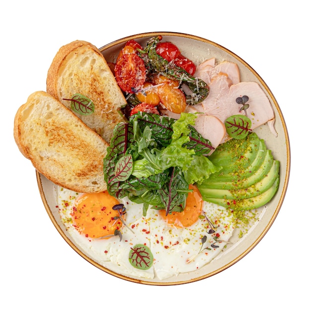 Gebakken eierenontbijt met salade en avocado