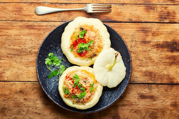 Gebakken pompoen en courgette met quinoa