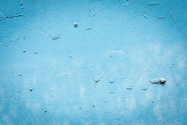 Gebarsten muur geschilderd in blauw - achtergrond - patroon.