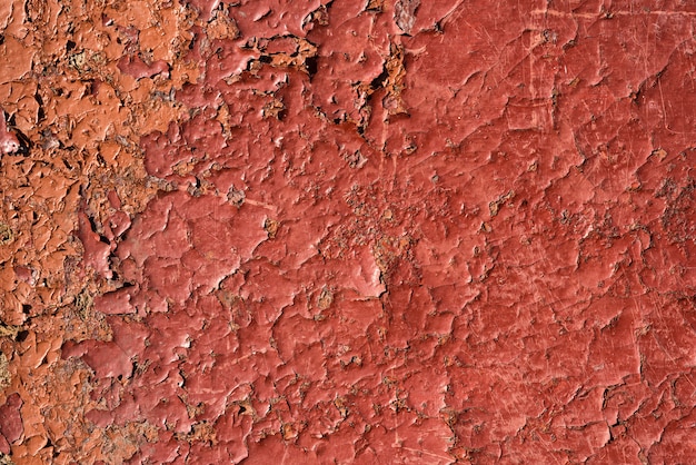 Foto gebarsten rode verf met roest. naadloze oude textuurachtergrond