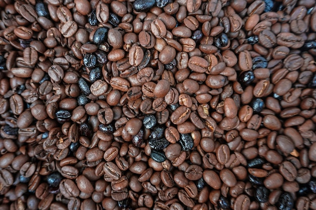 gebrande bonen koffie, bruine achtergrond