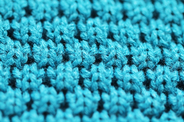 Gebreide achtergrond close-up van blauwe kleur
