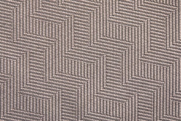 Gebreide textuur Textuur van jacquardstof met grijs geometrisch patroon Gehaakt mozaïekpatroon