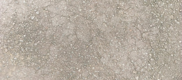 Gebroken en gestructureerd grijs betonnen oppervlak