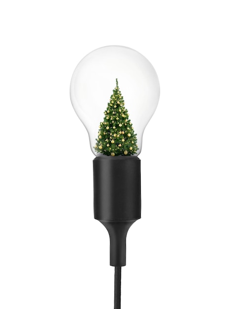 Gedecoreerde kerstboom binnenkant van gloeilamp op witte achtergrond inspiratie concept