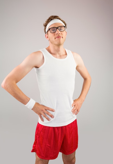 Geeky hipster posing in sportswear