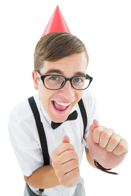 Geeky hipster wearing a party hat