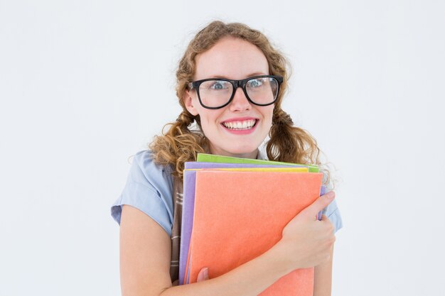 Geeky hipster woman holding files 