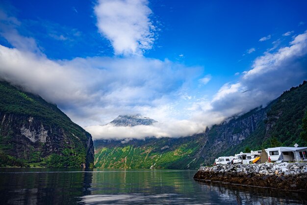 Geiranger fjord, Beautiful Nature Norway. Family vacation travel RV, holiday trip in motorhome, Caravan car Vacation. Geiranger Fjord, a UNESCO World Heritage Site