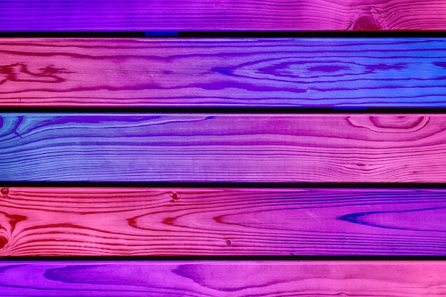 Gekleurde achtergrond met kleurovergang. horizontale houten planken
