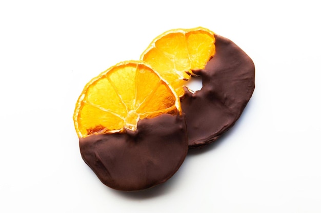Gekonfijte sinaasappelschijfjes in chocolade